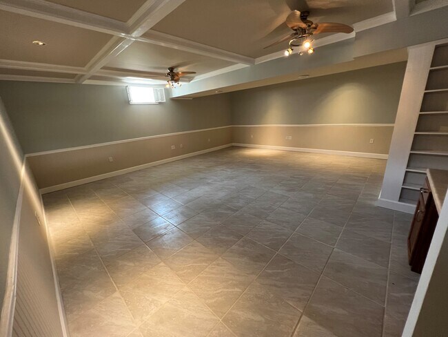 Stunning family room includes many modern features - 11810 White Pine Dr