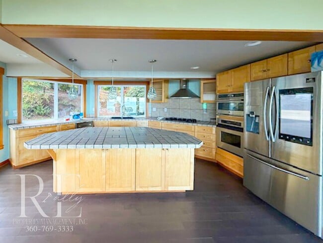 Building Photo - Waterfront Rustic Retreat with Vaulted Ceilings, Picture Windows & Lofted Nook