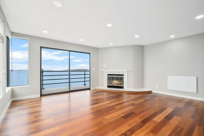 Building Photo - Stunning ALKI WATERFRONT Condo Overlooking Majestic Puget Sound!