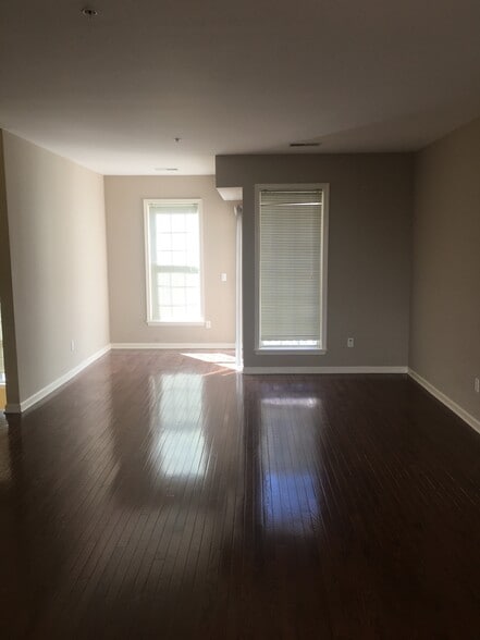 Living Room showing windows and work alcove - 201 Dey St