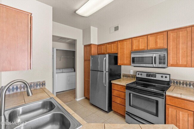Building Photo - 7050 E Sunrise Dr