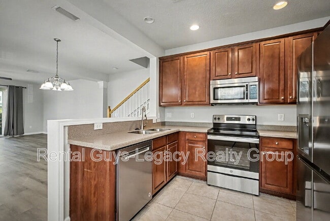 Building Photo - 6986 Roundleaf Dr