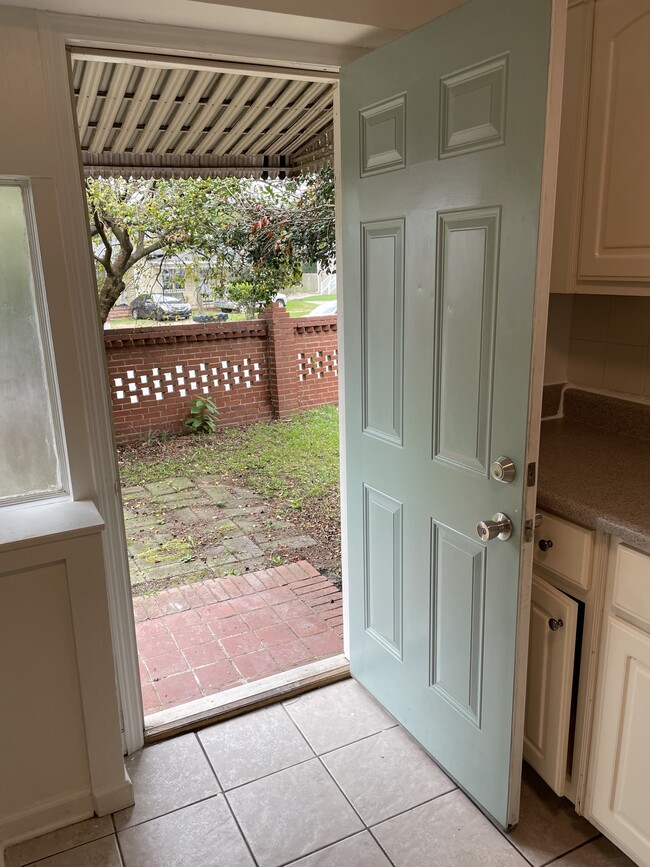 Exit to private yard from kitchen - 2000 Central Ave