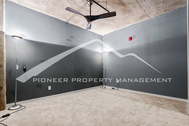 Building Photo - Modern Industrial Condo Downtown with Park...