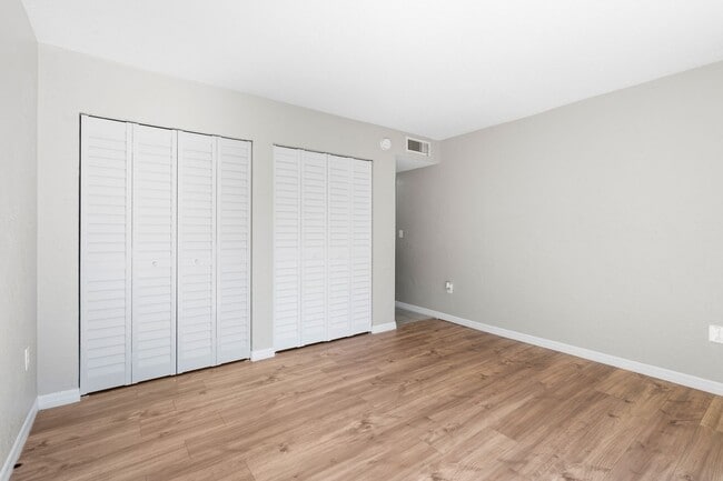 Building Photo - Fully Renovated 3BR/2BA Condo with Private Fenced Yard – Prime Location Near Oaks Mall & I-75