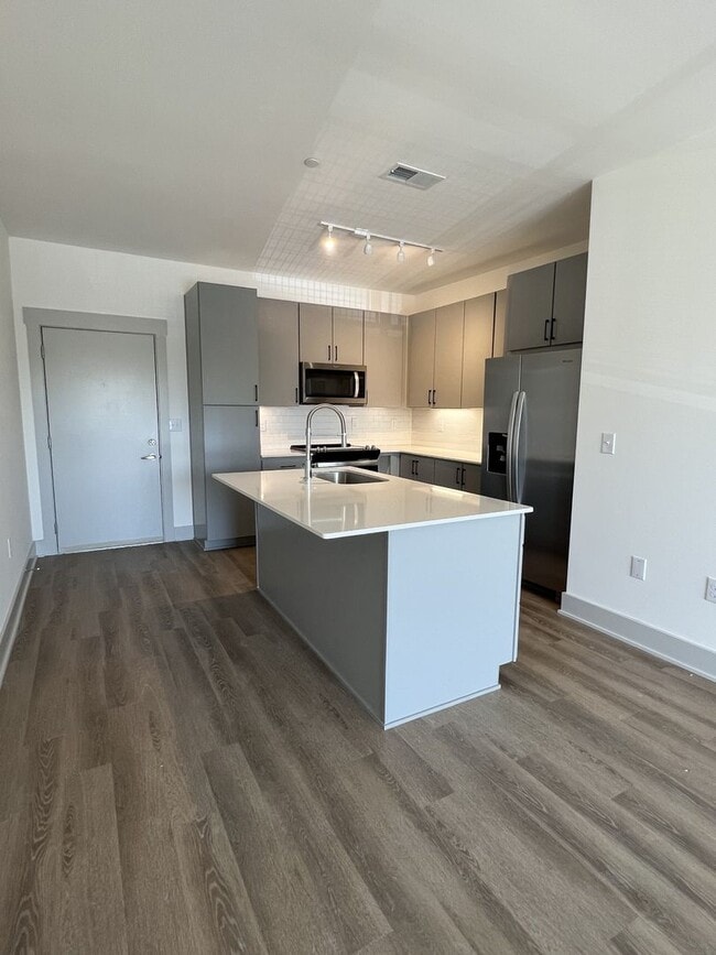 Building Photo - Top floor WEHO condo in new development