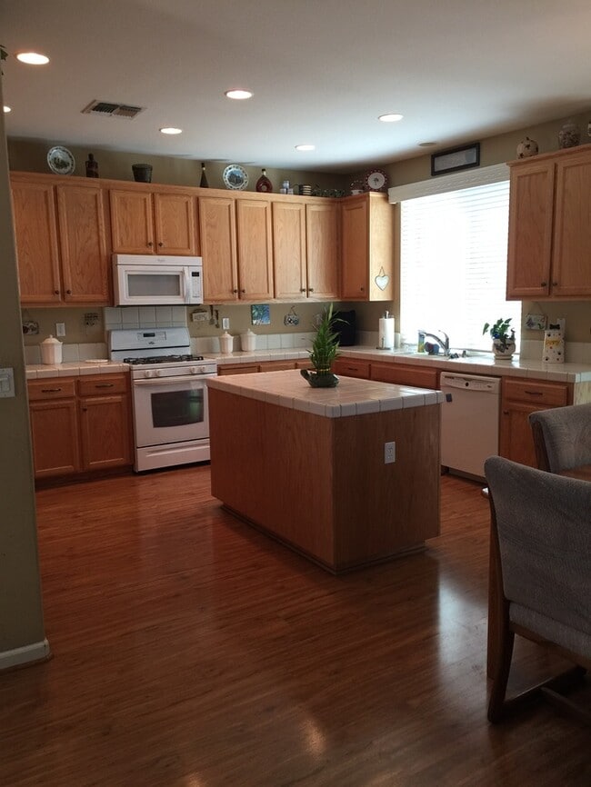 Building Photo - Spacious two-story home featuring 4 bedrooms and 3 full bathrooms (1 bedroom and 1 bathroom downs...