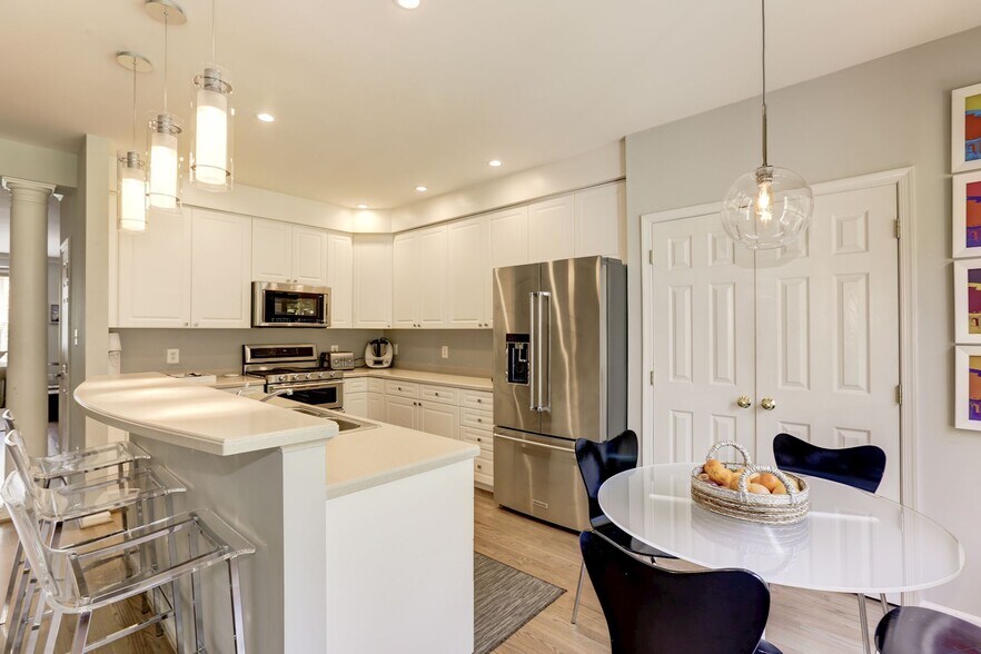 Kitchen with Updated Appliances and Countertops - 5742 Governors Pond Cir