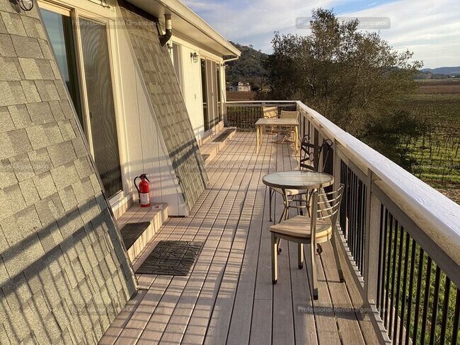 Building Photo - A price and views that can't be beat- Upper Flat with deck & expansive Vineyard and Sunset views