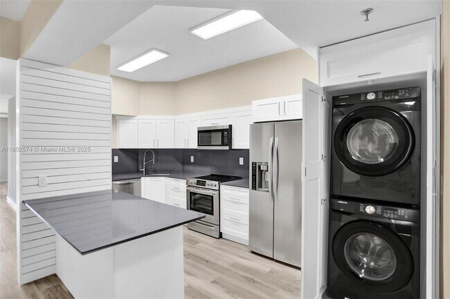 Building Photo - 8816 Collins Ave