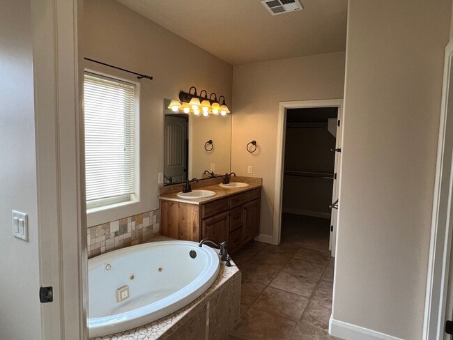 Building Photo - MONTH TO MONTH LEASE ONLY. Beautiful Custo...