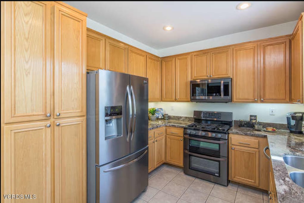 Before cabinets painted - 530 Bannister Way