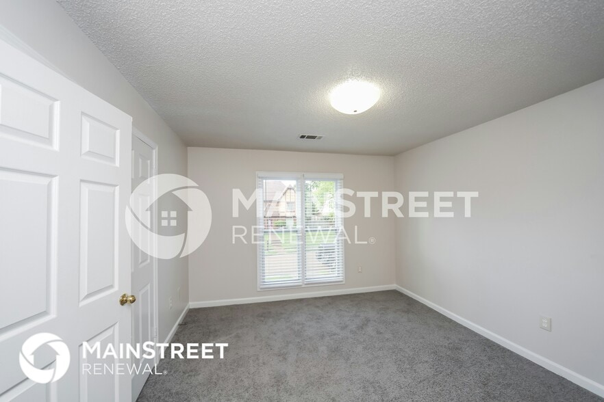 Building Photo - 8849 Woodmark Dr