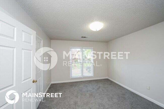 Building Photo - 8849 Woodmark Dr