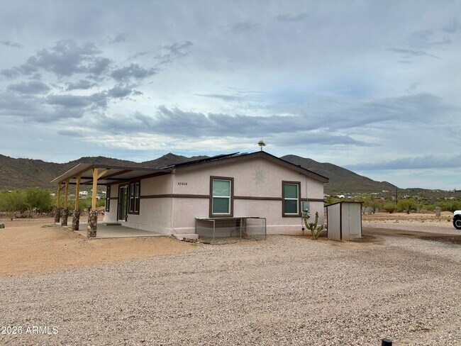 Building Photo - 42608 N 6th Ave