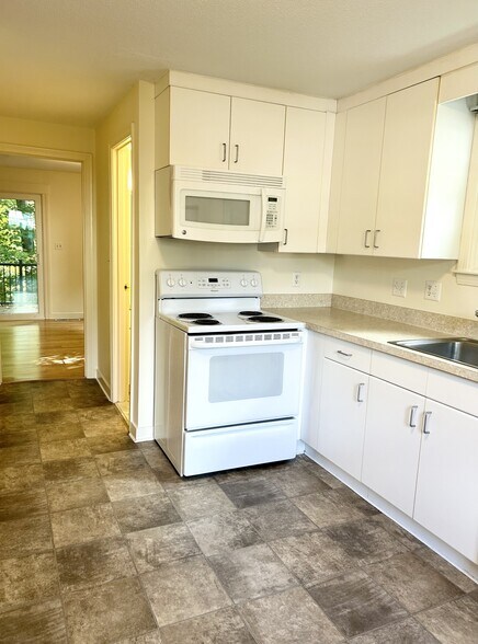New kitchen currently being installed - stainless steel appliances and granite counter tops - Hawthorne Village