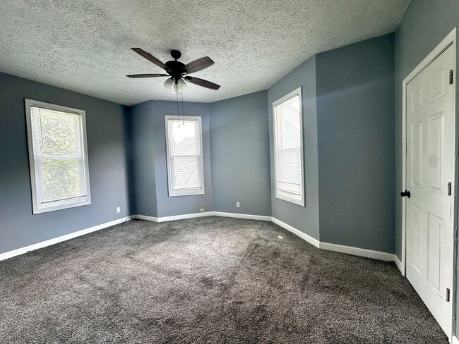 Building Photo - Step into charm, comfort, and convenience in the heart of Historic Farrington’s Grove!