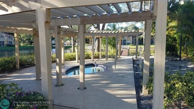 Building Photo - 4759 Via Palm Lakes
