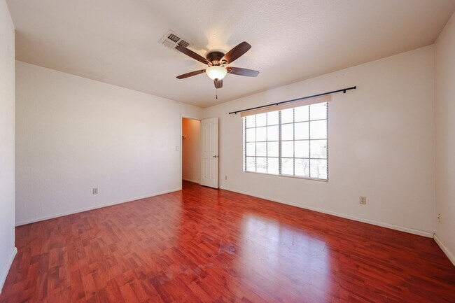 Building Photo - Welcome to this stunning 4-bedroom, 2-bath...