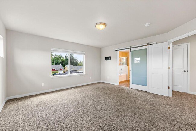 Building Photo - Modern 4-Bedroom Yelm Home with Covered Patio, Outdoor Fireplace & Office/Flex Space!