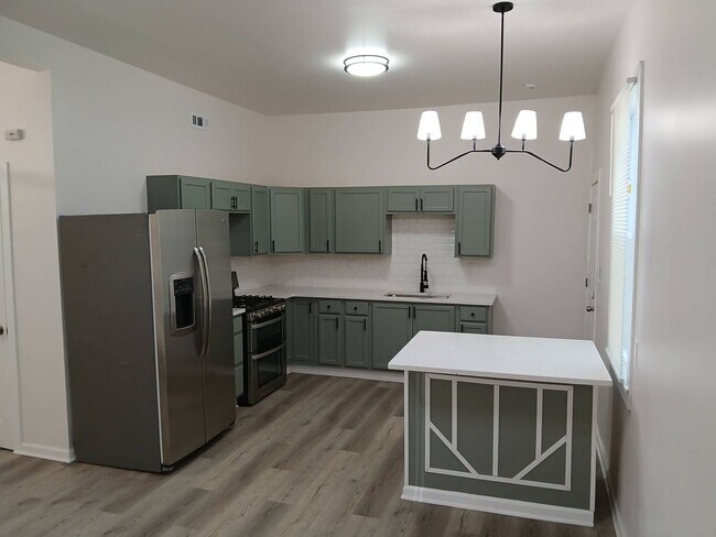 Building Photo - 6015 Hosmer Ave