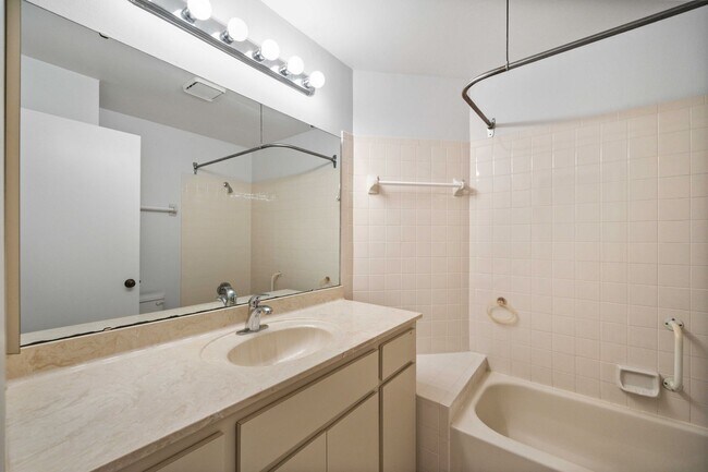 Building Photo - Beautiful Must See!! 3/2 Plus Sunroom & Garage!!  Gated Community!!