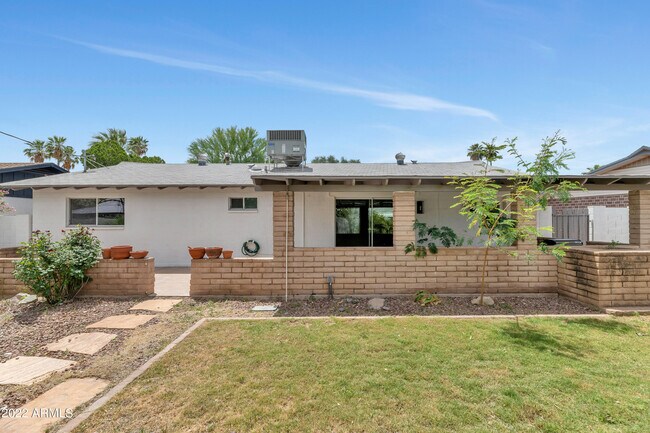 Building Photo - 8444 E Plaza Ave