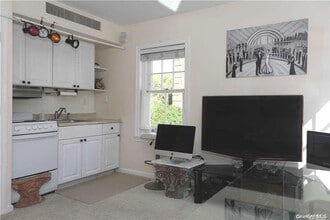 Building Photo - 1392 Old Northern Blvd