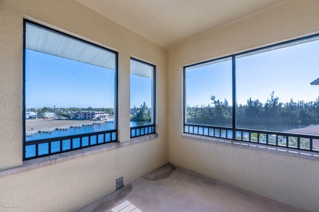 Building Photo - PRICE DROP!! Luxury Waterfront Living with Deeded Dock – Punta Gorda Isles