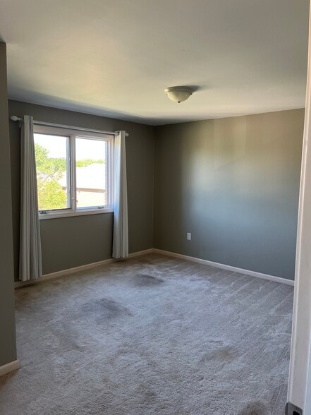 Bedroom 2 featuring 1 closet - 53314 Zachary Dr