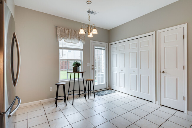 Bright Eating Area overlooking Patio! - 1101 Downs Blvd