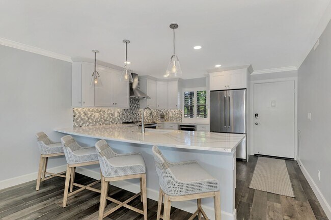 Building Photo - LUXURY LONGBOAT LIVING AT IT’S FINEST! AVA...
