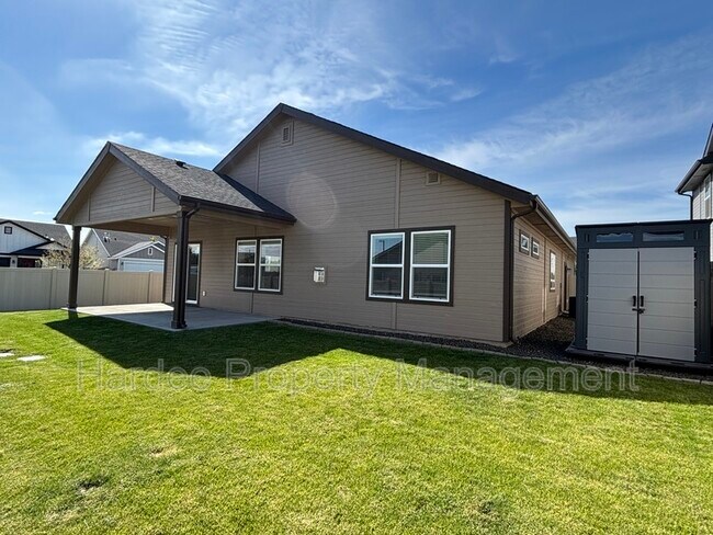 Building Photo - 9070 W Songwood Dr