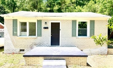 Building Photo - COZY 2/1 HOME MINUTES FROM DOWNTOWN COLUMBIA