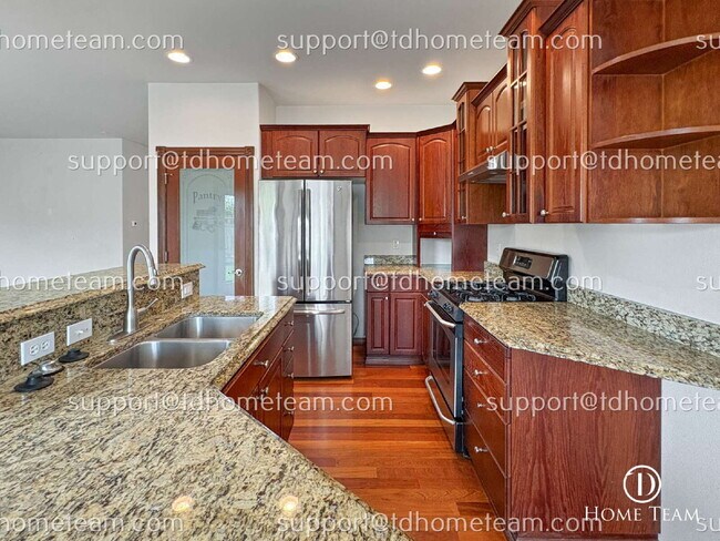 Building Photo - "Spacious 4-Bed Oasis in Kent with Elegant Granite & Hardwood Finishes!"