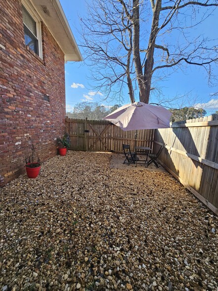 Outside entrance with patio & fenced area - 3150 Clifton Church Rd SE