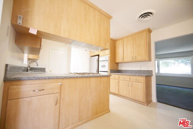 Building Photo - 7309 Asman Ave