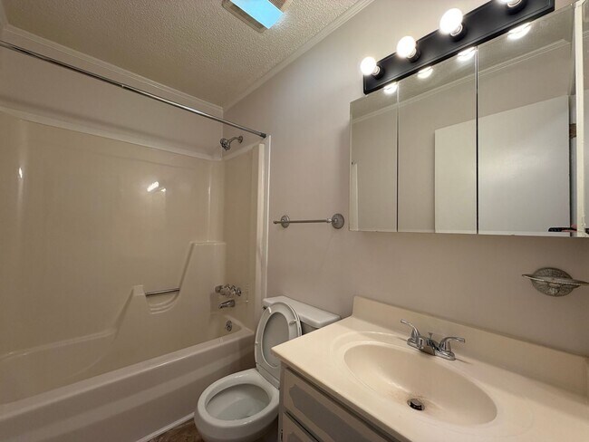 Building Photo - Large 4/2 with finished basement/bonus room- $1,895