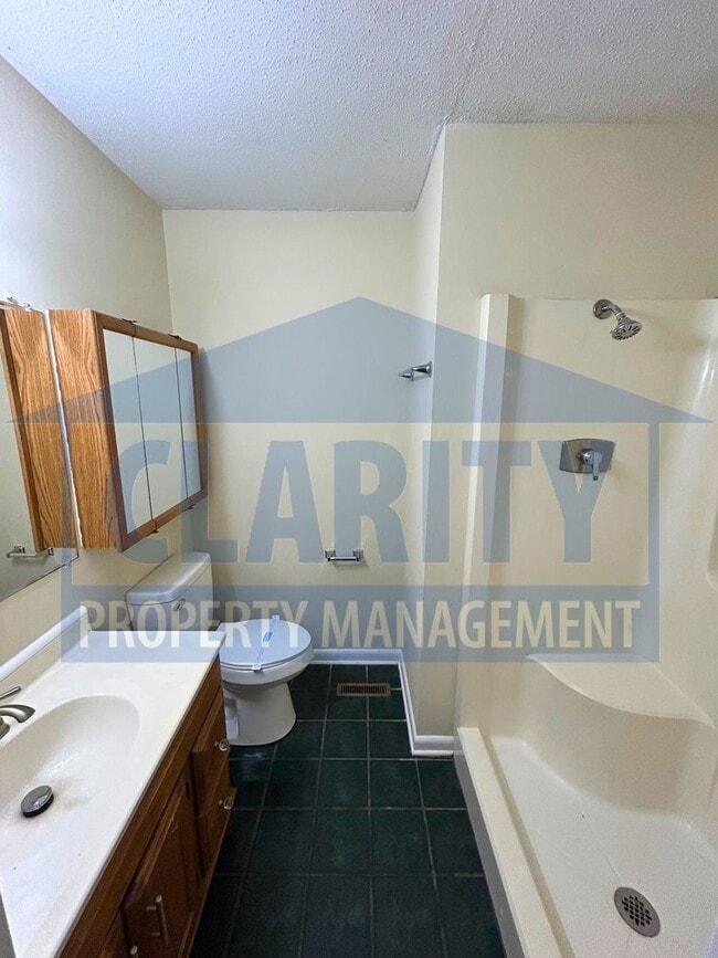 Building Photo - Three bedroom home w/ two bonus rooms!