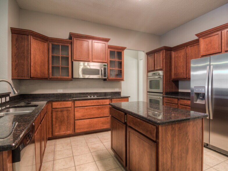 Building Photo - 16380 Bamboo Bluff Ct