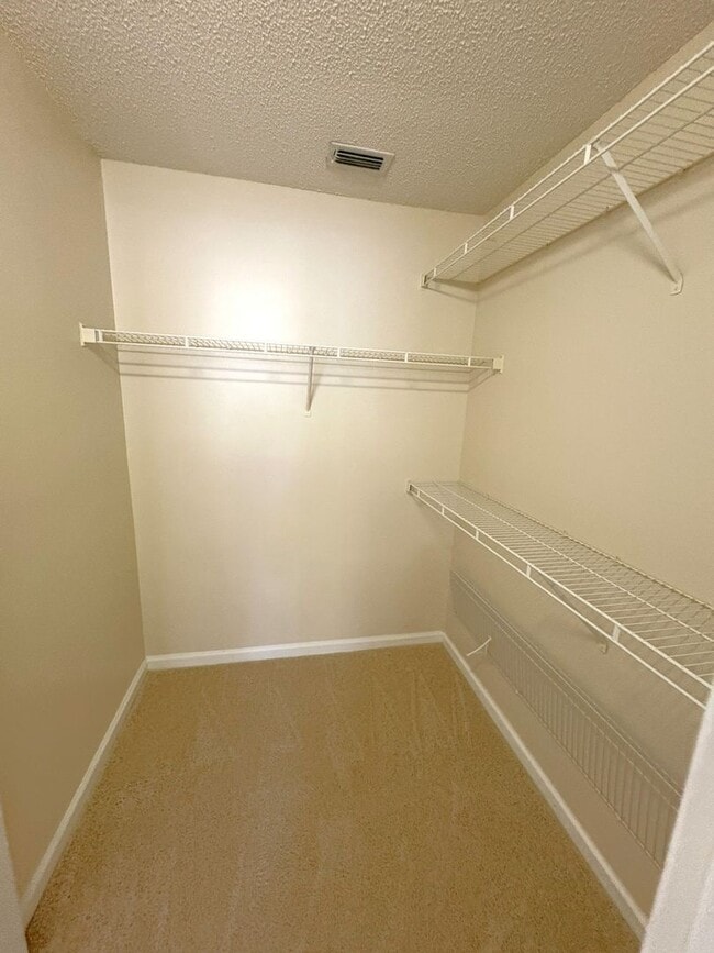 Building Photo - Check out this beautiful 3 Bedroom, 2 Bath with Volume ceilings!