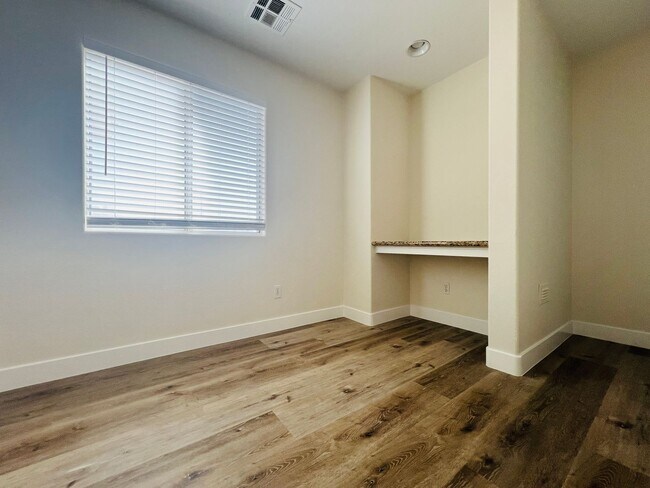 Building Photo - REMODELED, SPACIOUS, 4 BEDROOM HOME WITH VAULTED CEILINGS AND LOFT