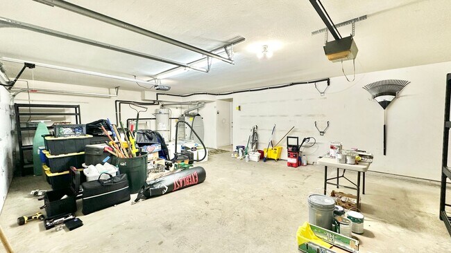 Building Photo - Spacious Two-Story Home with Three-Car Att...