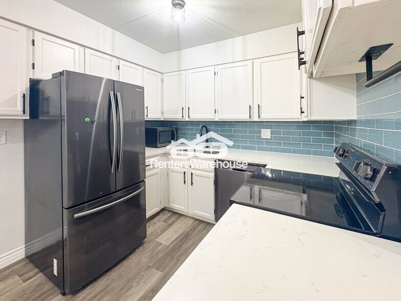 Building Photo - 12073 E Harvard Ave