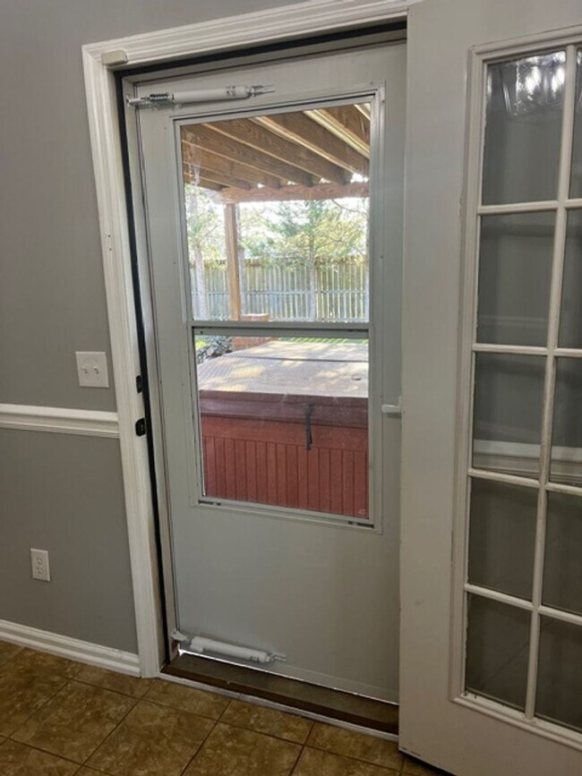 Building Photo - Charming All-Brick Corner Lot Home with Hot Tub & Fenced Yard