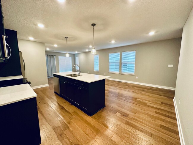 Building Photo - {13305} Less Than 2 Year Old 1.5 Story in ...