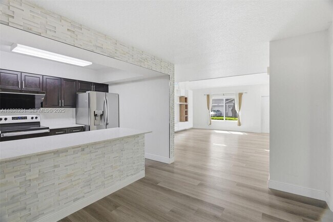 Building Photo - 12153 SW 49th Ct