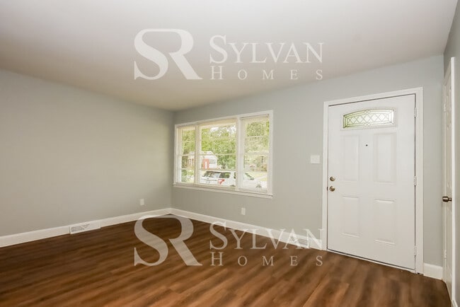 Building Photo - Lease today! No extra charge for contentme...