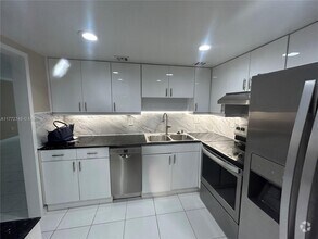 Building Photo - 5701 Collins Ave