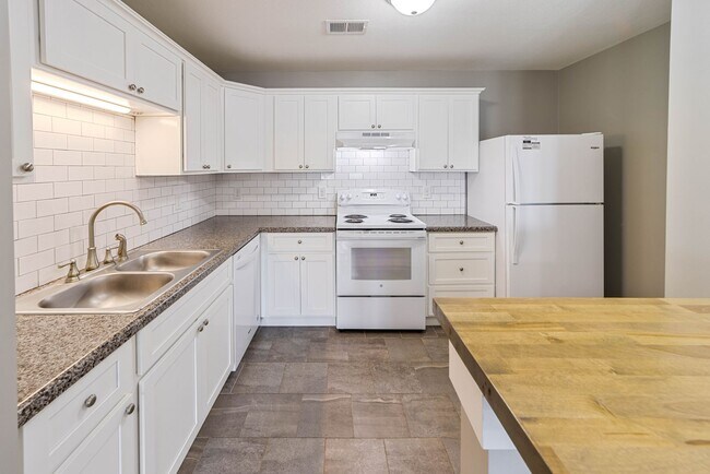 Building Photo - The Magnolia- Our Two Bedroom With An Upda...